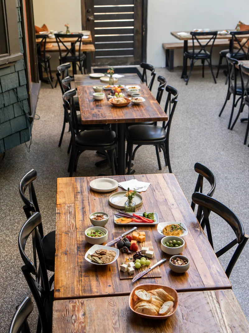 Patio tables arranged for a group meal